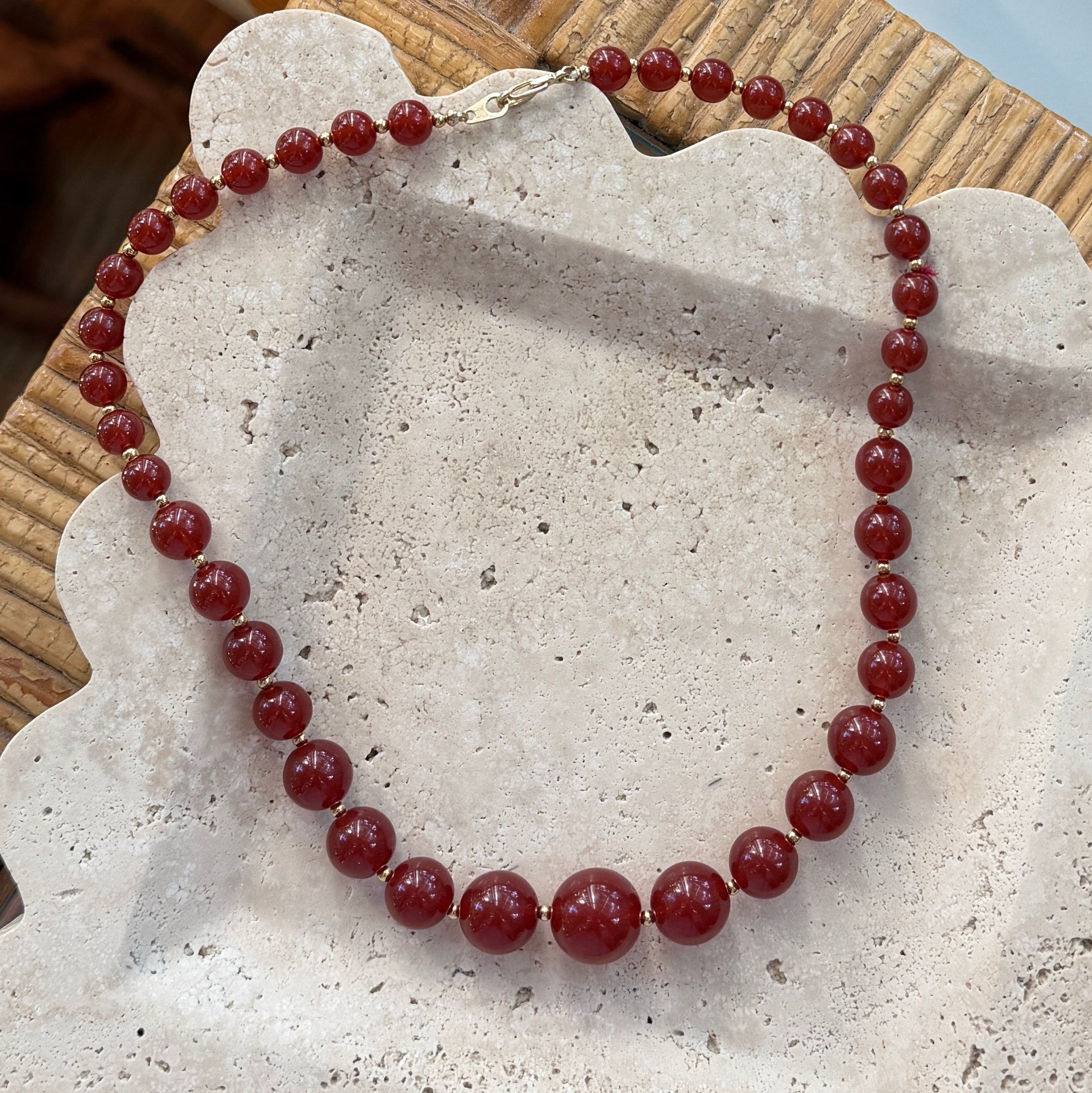 Orange and Red Bead Necklace with Gold Spacers
