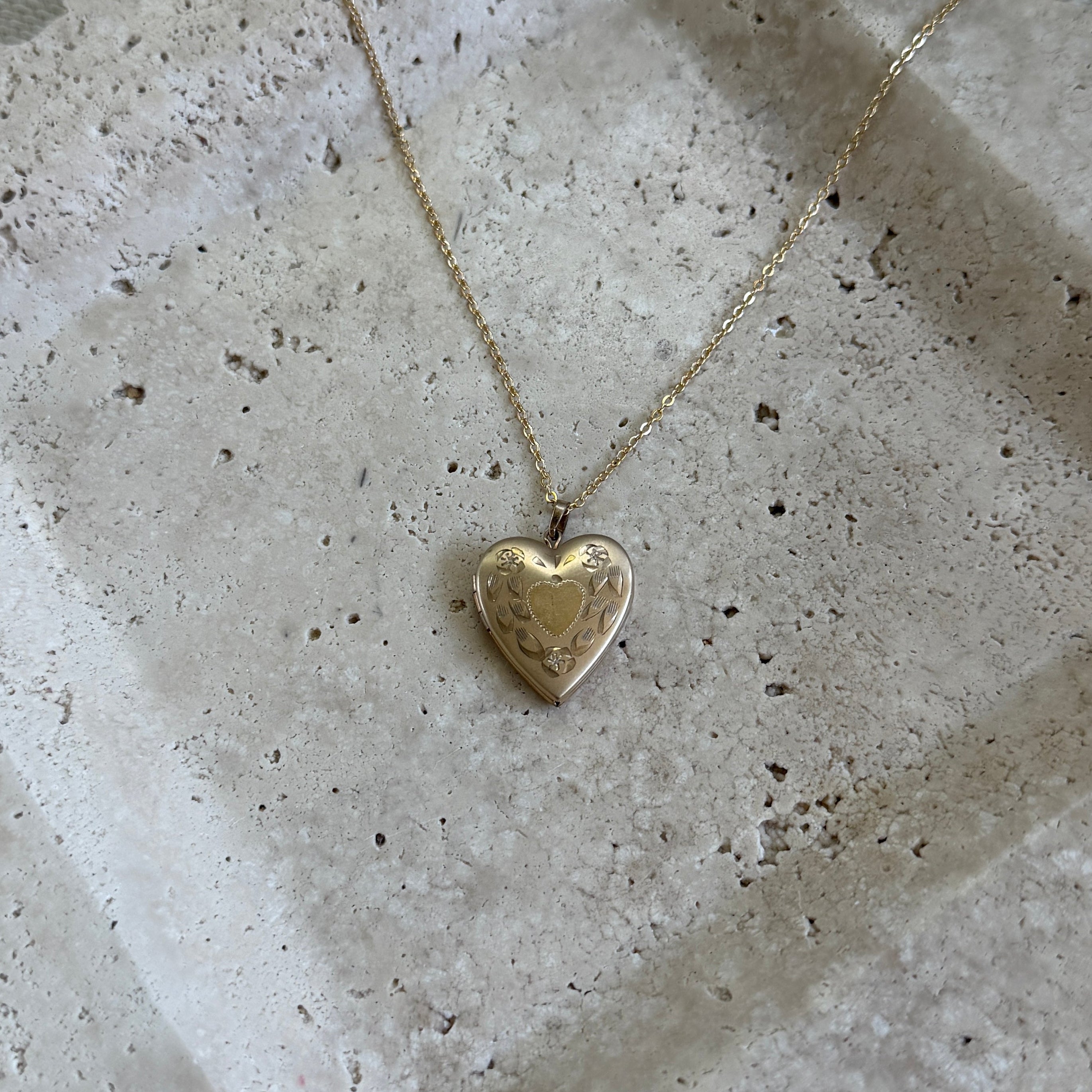 A Heart-Within-Heart Locket Necklace