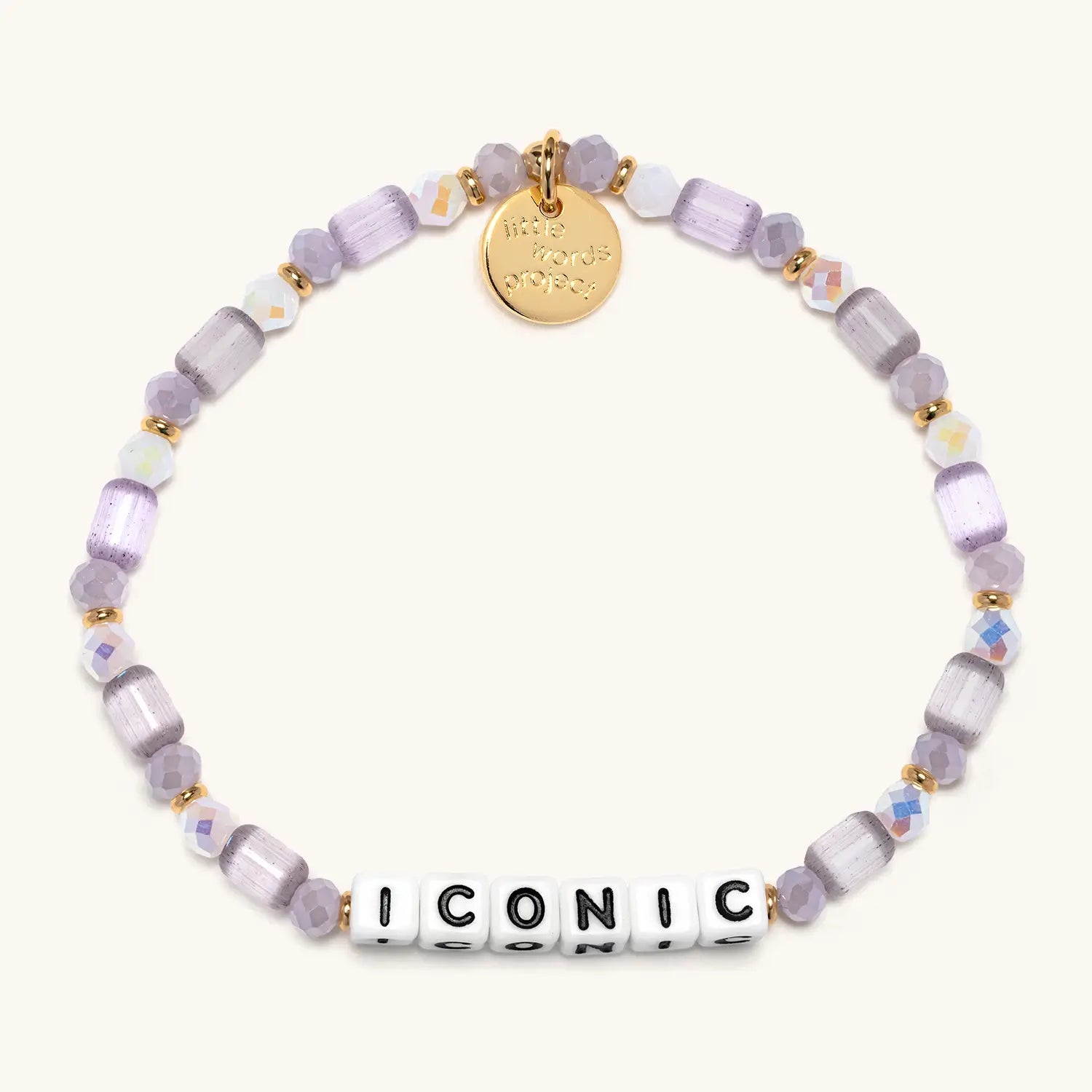 Bracelet with purple beads and gold accents on a white background