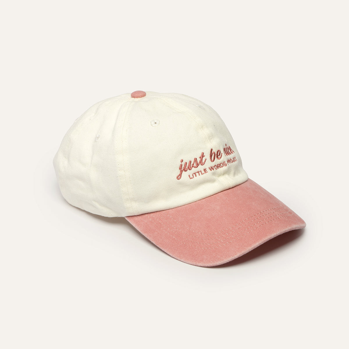 Just Be Nice hat, side view on a white background