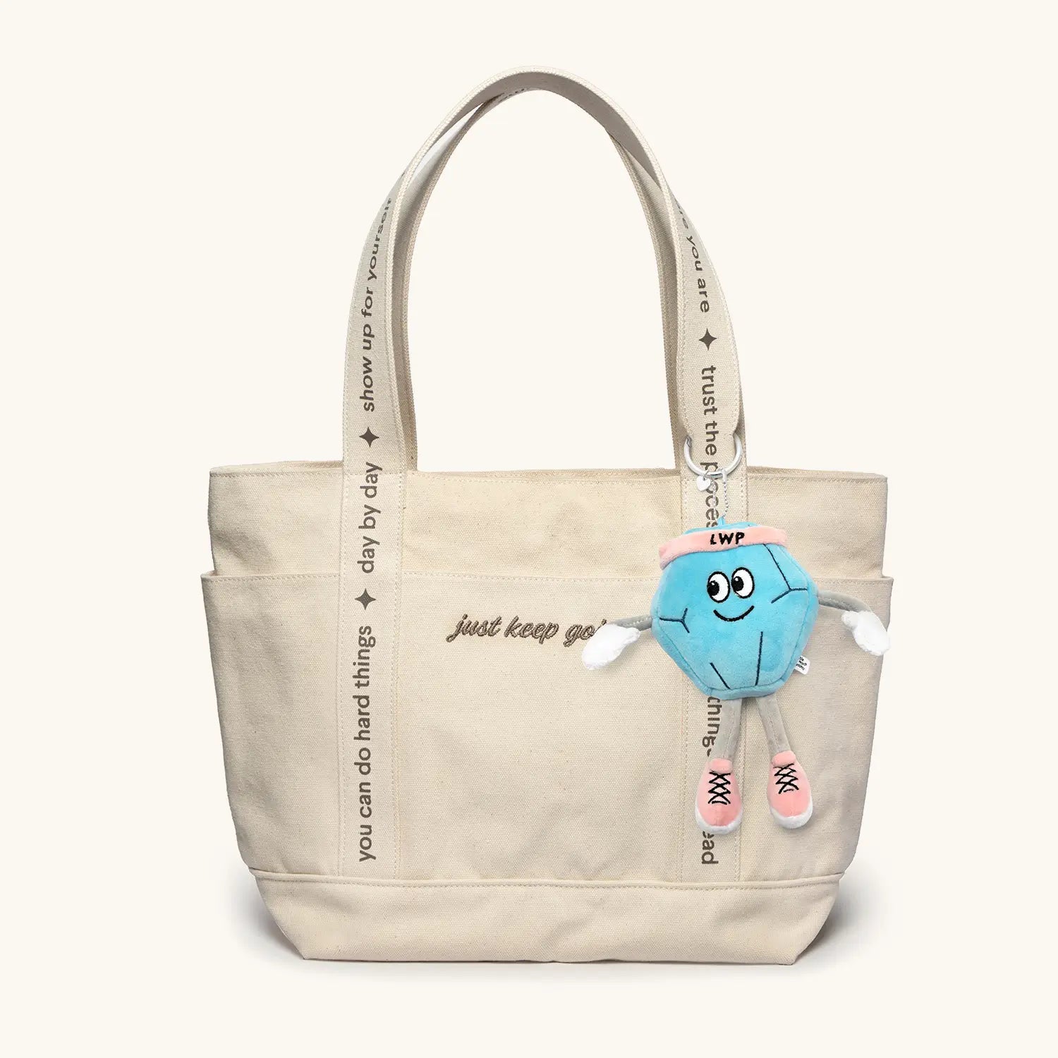 Little Words Project Sunday Run Club Essentials Set, tote and bag charm bundle flat-lay