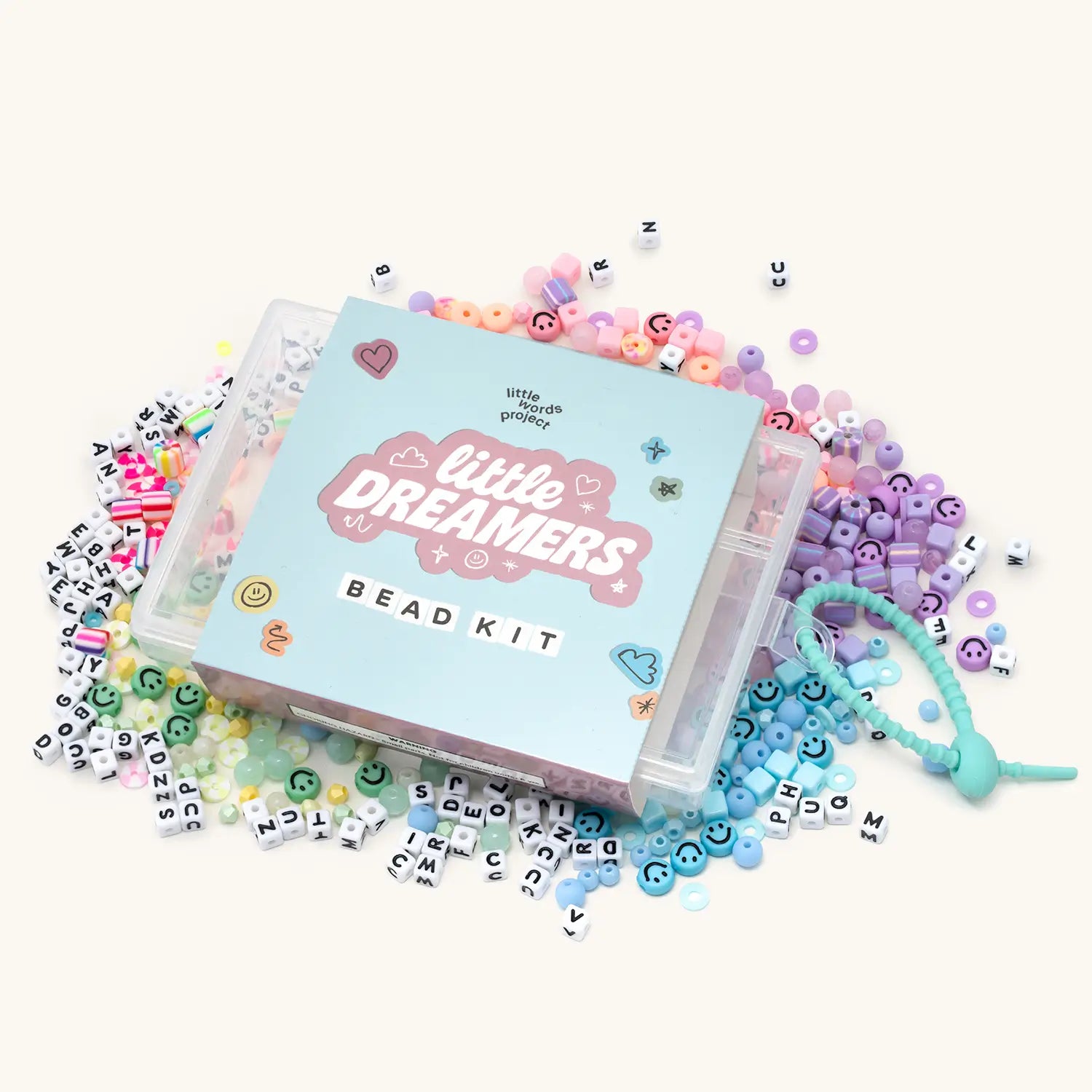 Bead kit with colorful beads and packaging on a white background