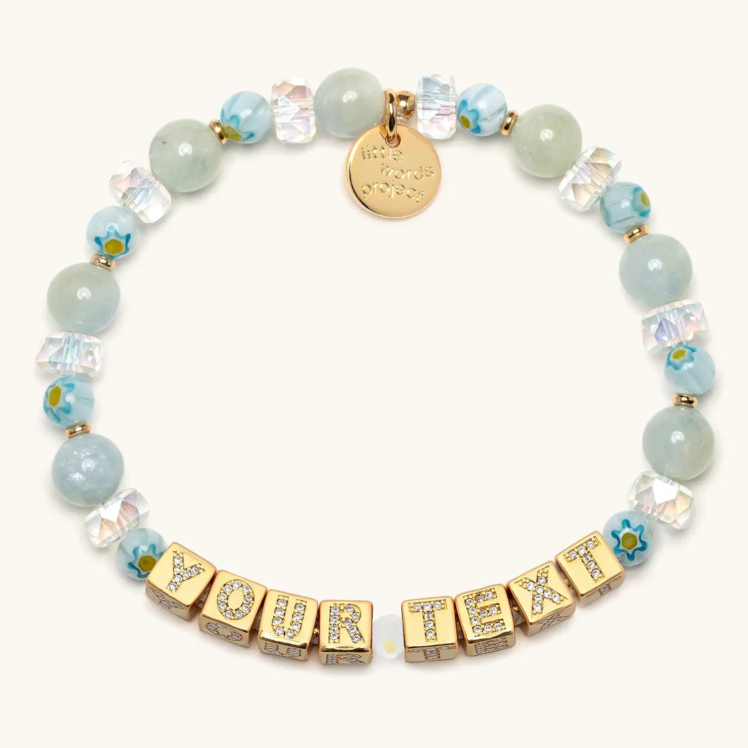 Bracelet with blue beads and Gold, bold text centered against a white background