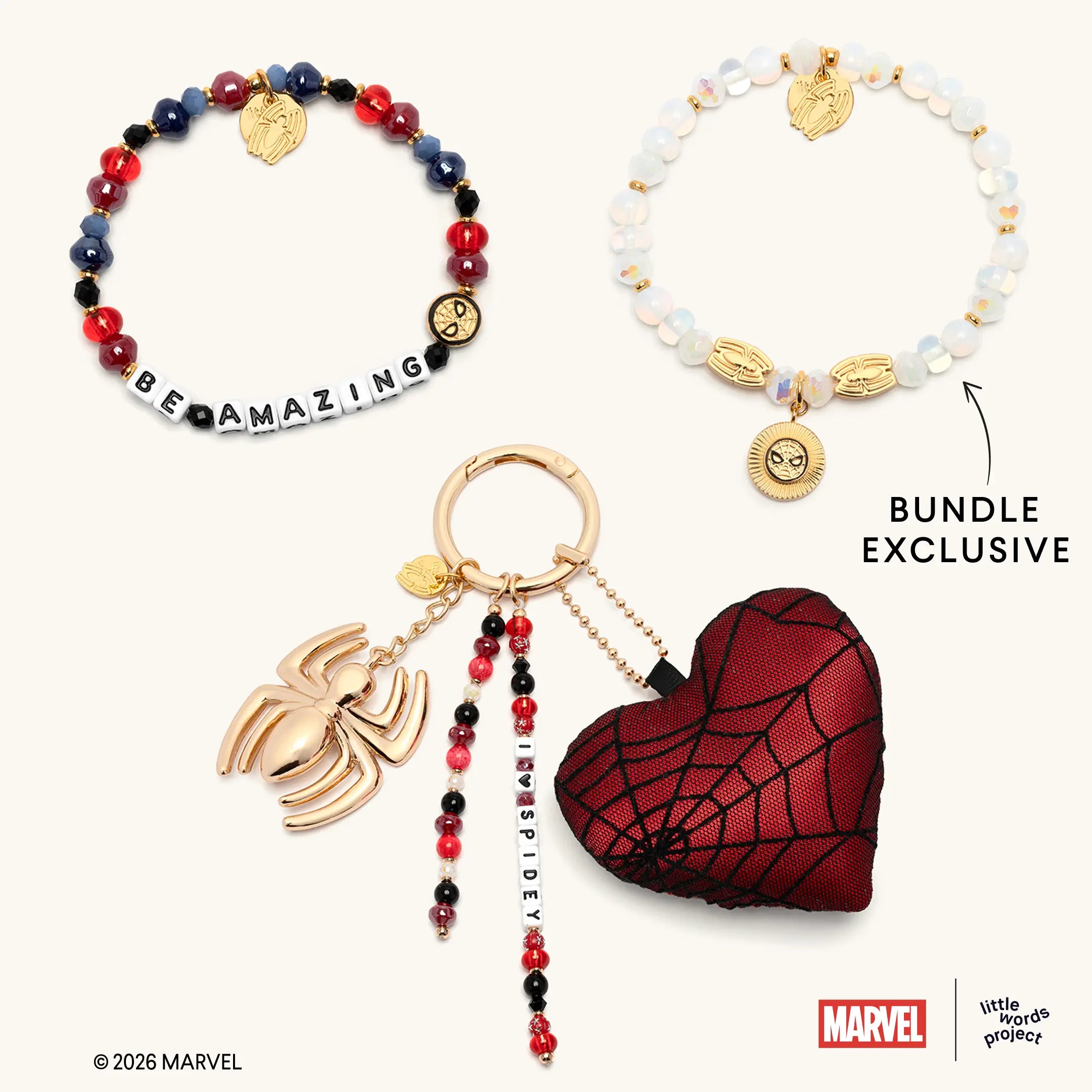 Friendly Neighborhood Faves Set from Marvel's Spider-Man collection, flat-lay on white background showing Be Amazing bracelet, Power Brings Responsibility Bracelet Base, and I Heart Spidey Bag Charm