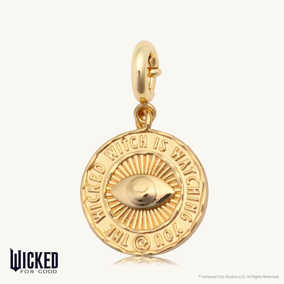 Gold pendant with engraved text on a white background, featuring the 'Wicked for Good' brand.