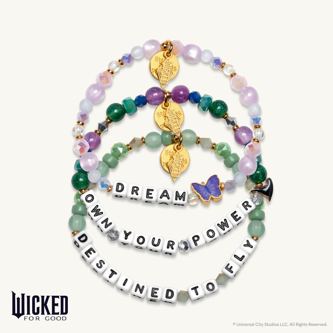 Set of beaded bracelets with motivational phrases and charms on a white background, featuring the brand 'Wicked for Good'.