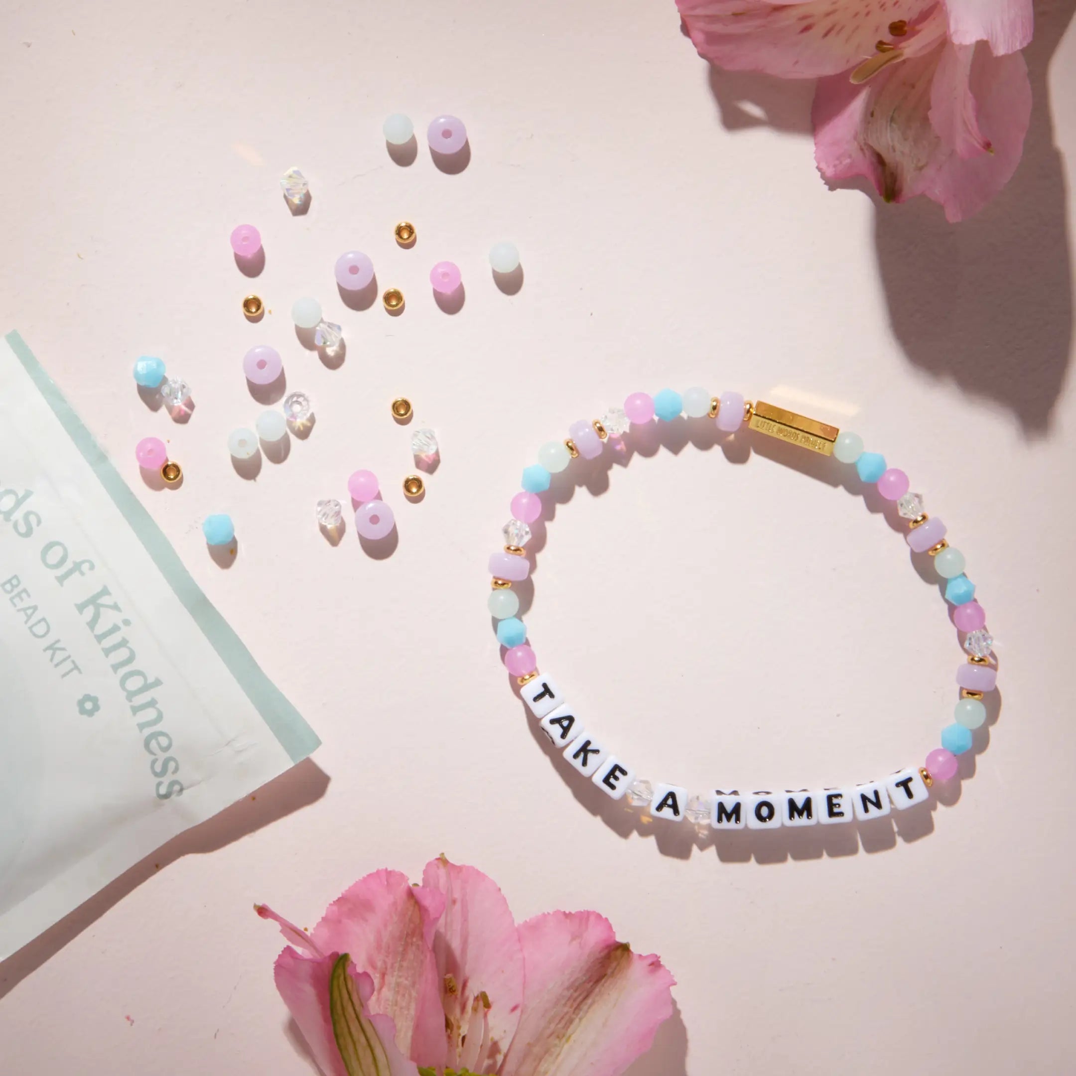 Take a Moment Bead Kit — lifestyle detail of completed beaded bracelet on wrist