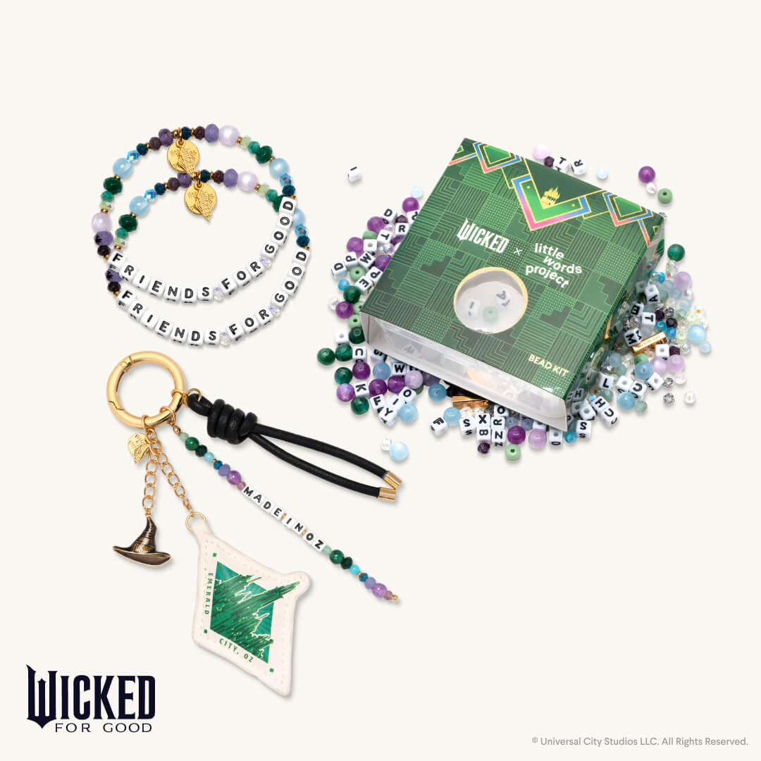 Wicked themed keychain, bracelet, and decorative items with 'Wicked for Good' branding.