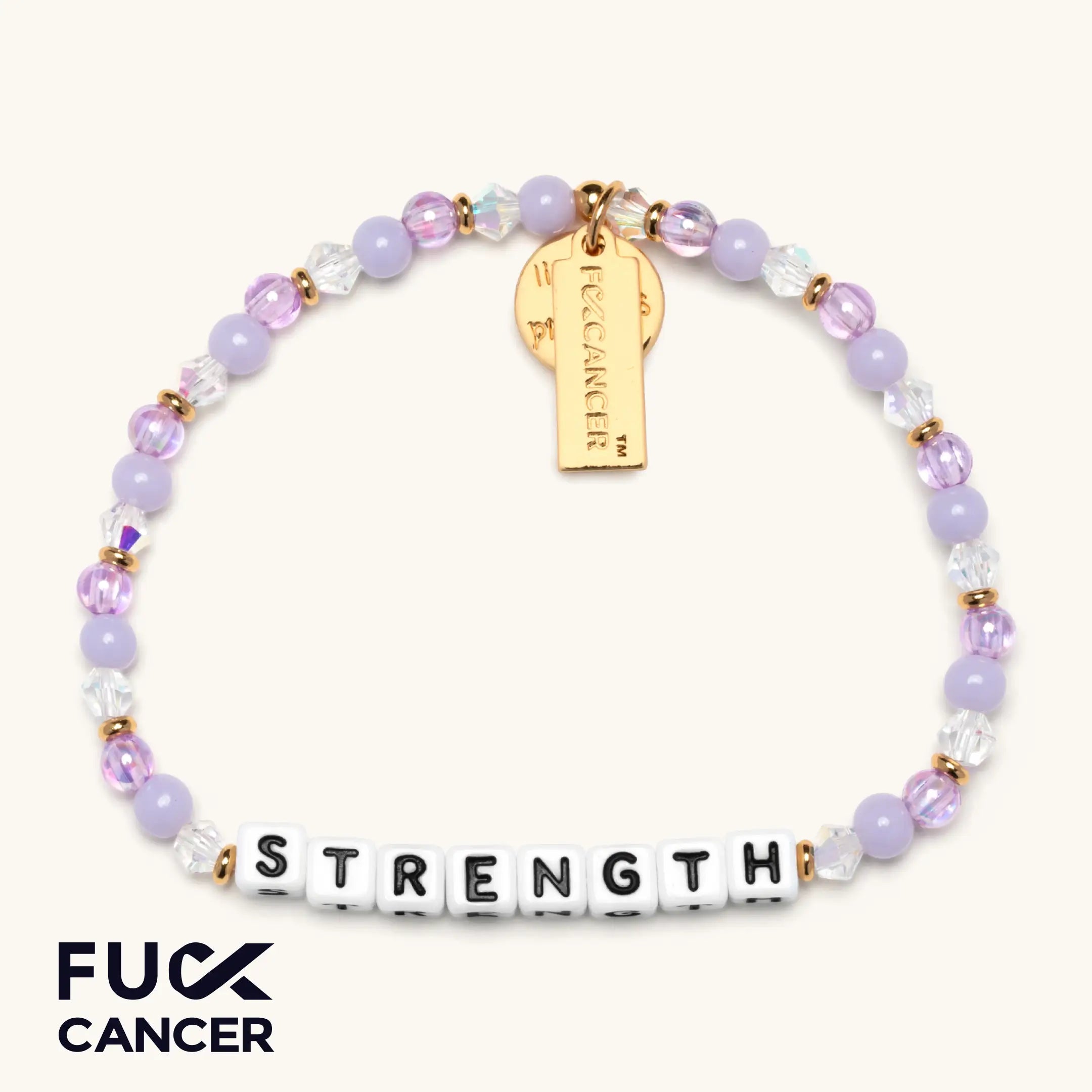 Bracelet with 'Strength' beads and gold tag on a white background, featuring the Fuck Cancer brand.
