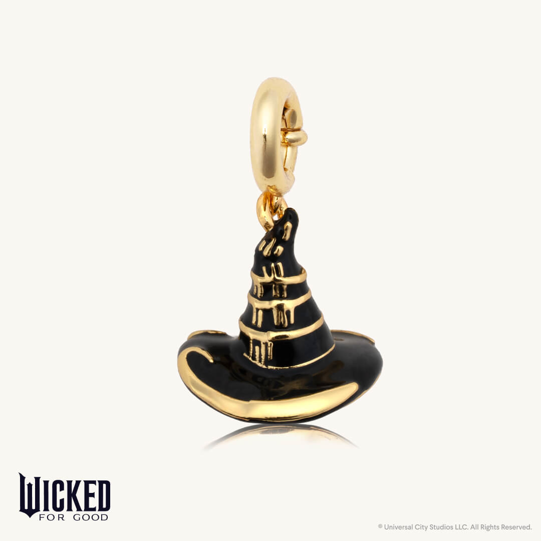 Black and gold witch's hat charm on a white background with 'Wicked for Good' branding.