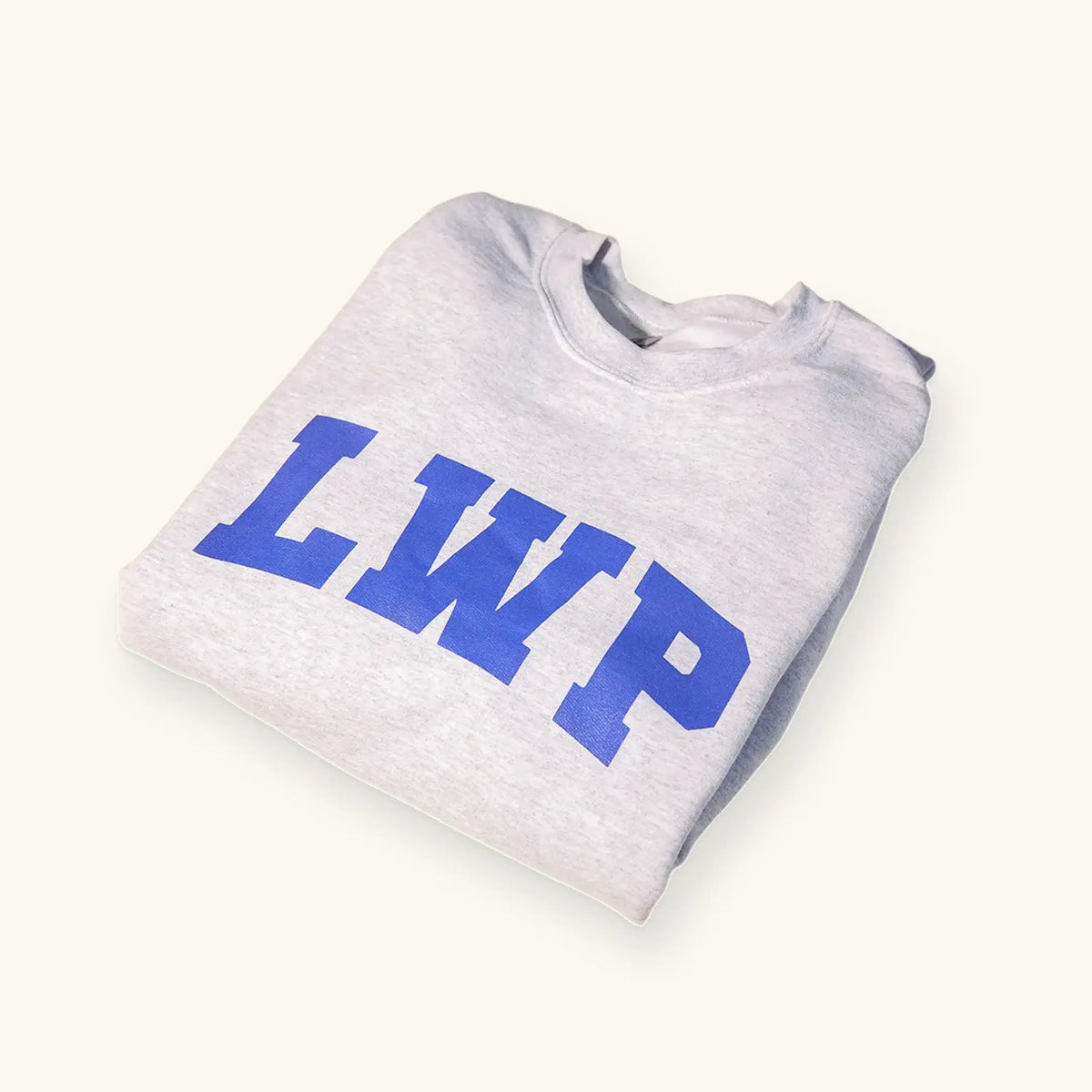 Folded gray sweatshirt with 'LWP' printed in blue on a white background