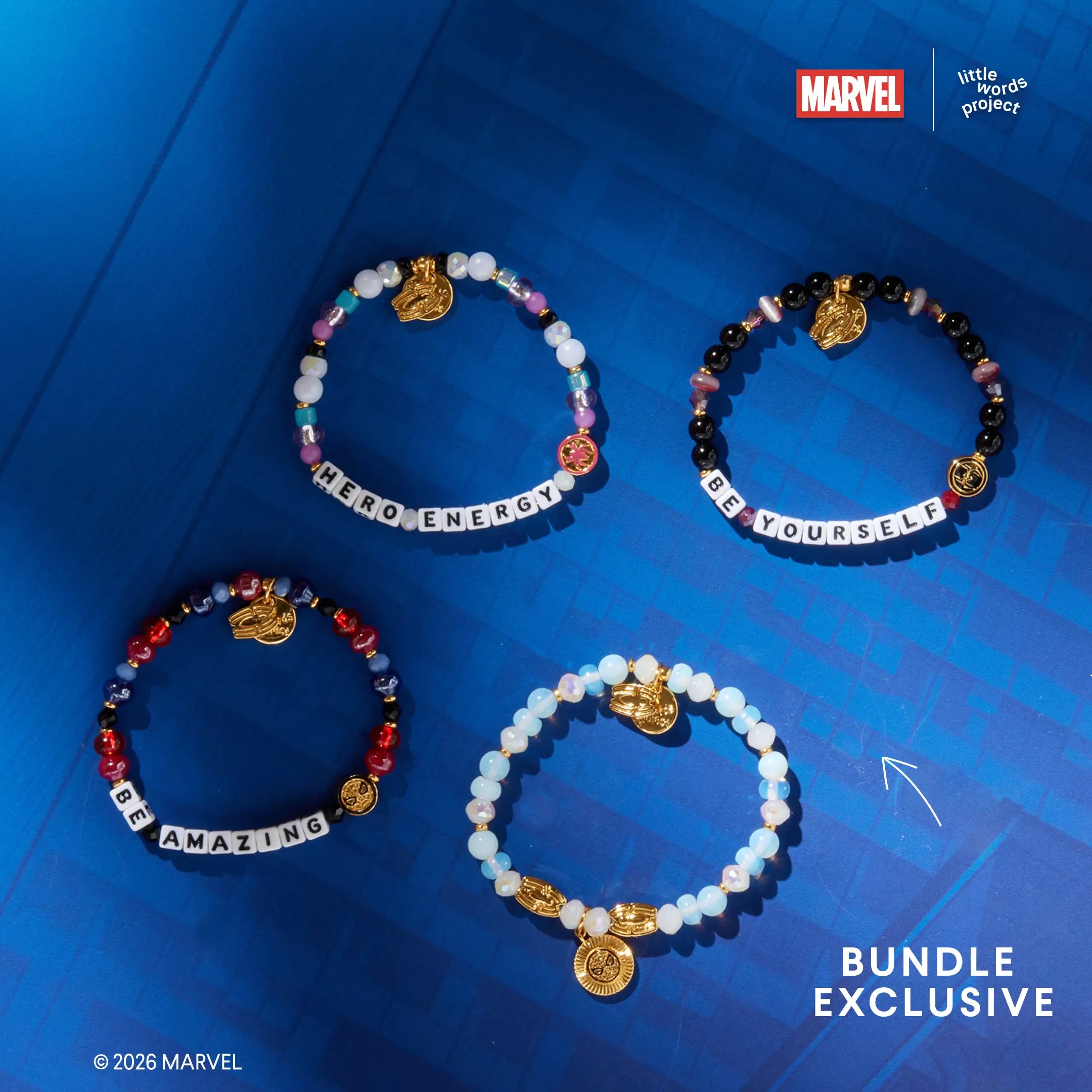 Power Brings Responsibility Bracelet Base from Marvel's Spider-Man collection flat-lay on blue background showing all four bracelets in the Spider-Man collection including the bundle exclusive bracelet base