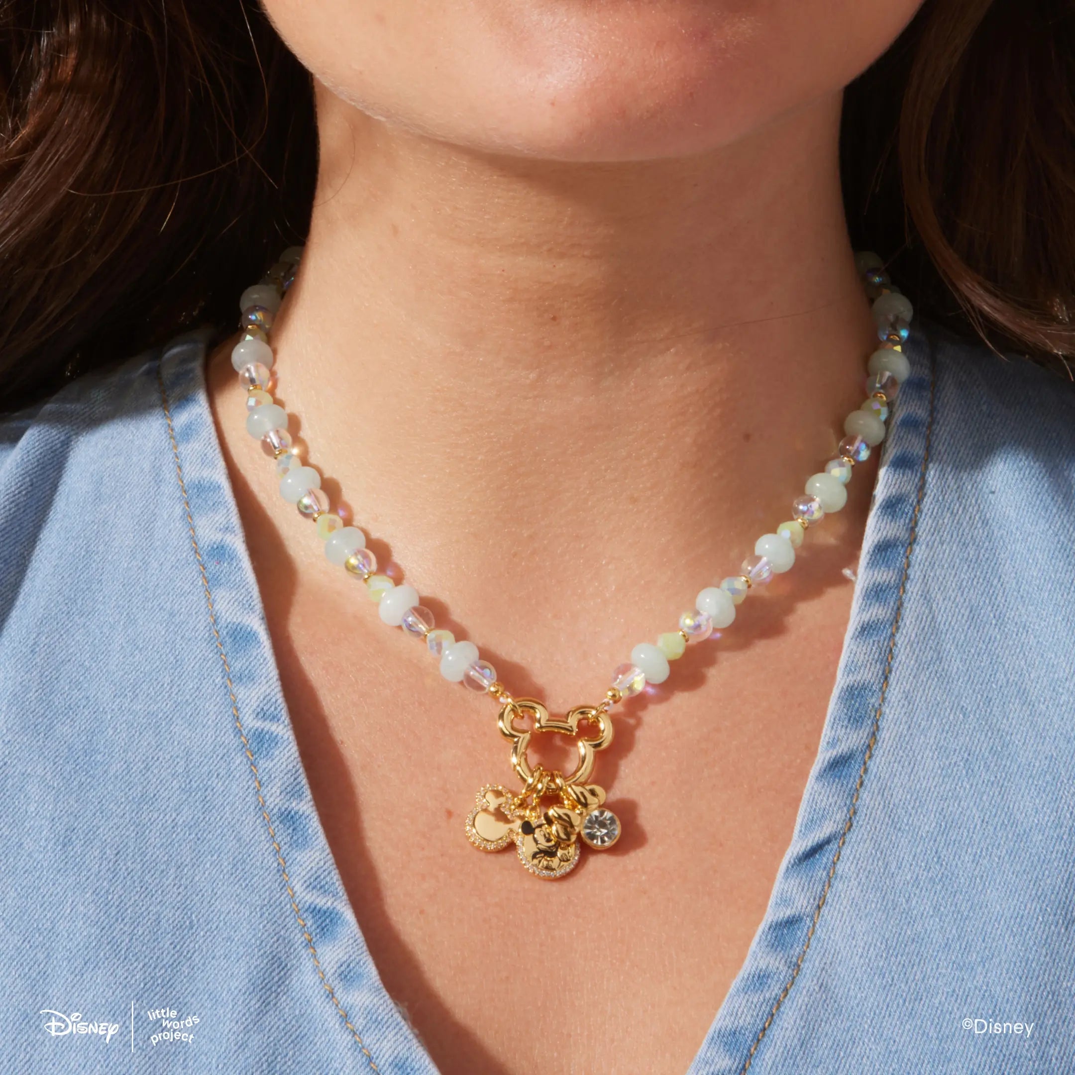 Mickey Mouse Charm Necklace Base from Disney Mickey and Friends worn on a model in a denim shirt, styled with gold plated Mickey Mouse and Minnie Mouse charms