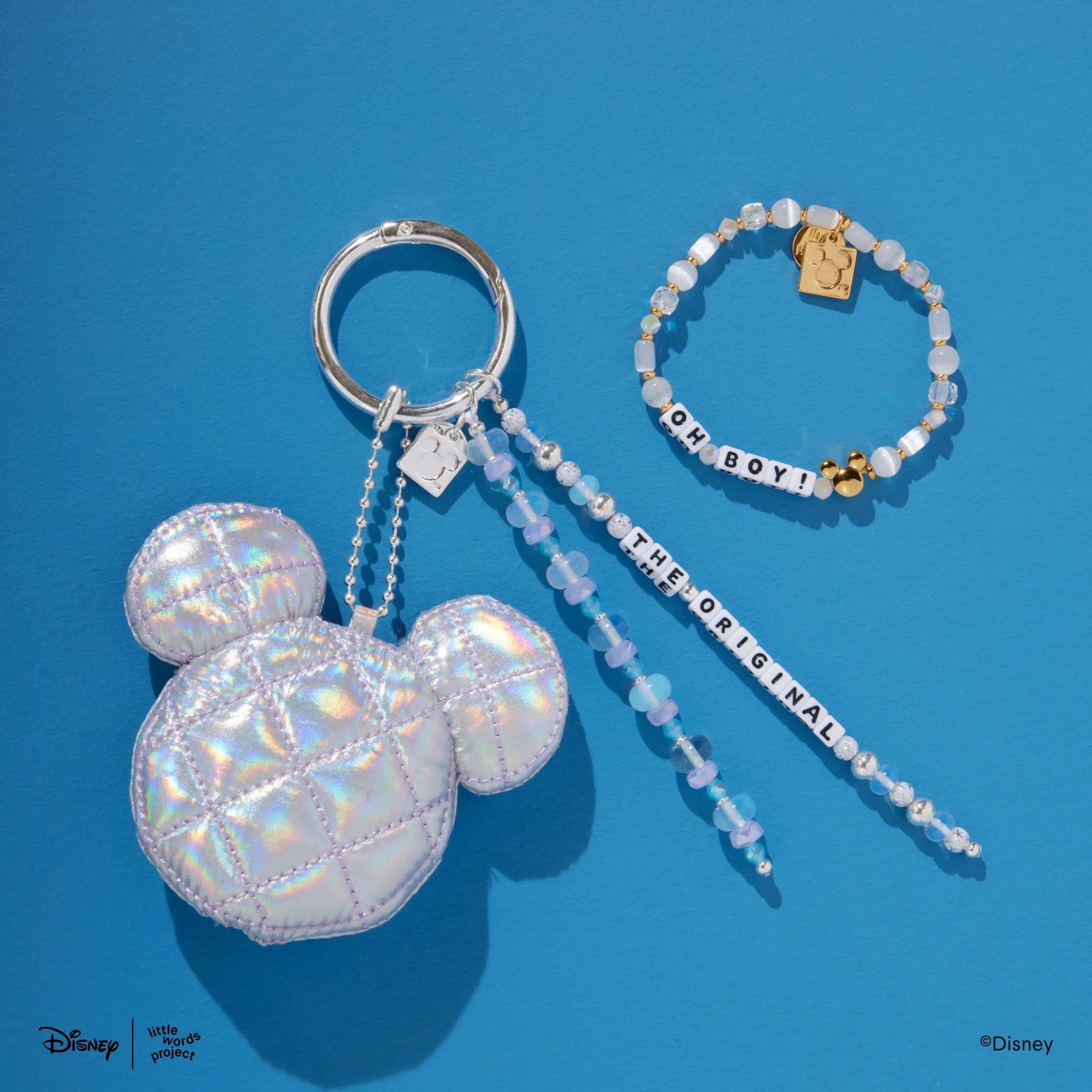 OG Magic Set from Disney Mickey and Friends on blue, The OG Bag Charm shown with the Oh Boy! beaded bracelet
