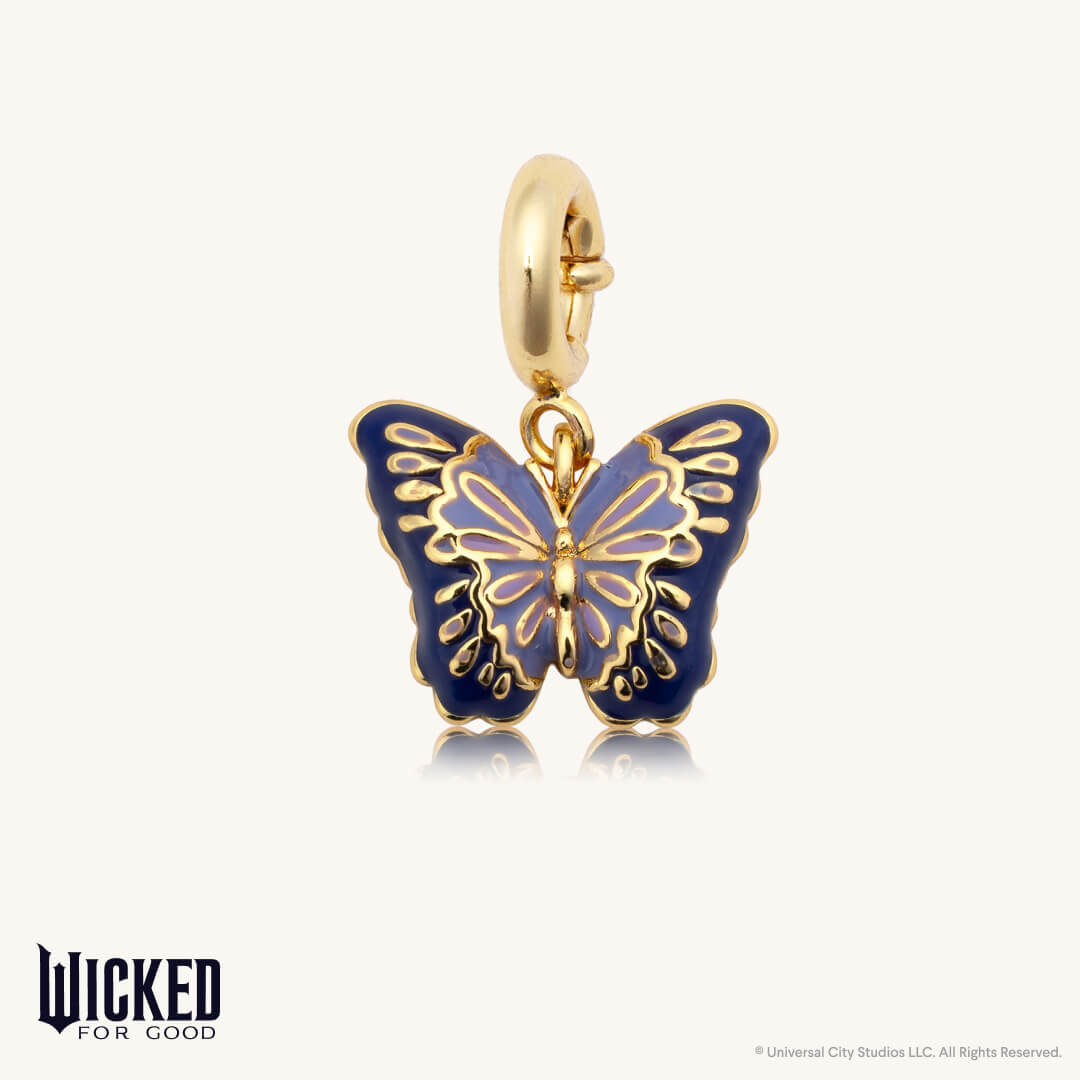 Butterfly charm with gold outline and blue body on a white background, featuring the 'Wicked for Good' brand.