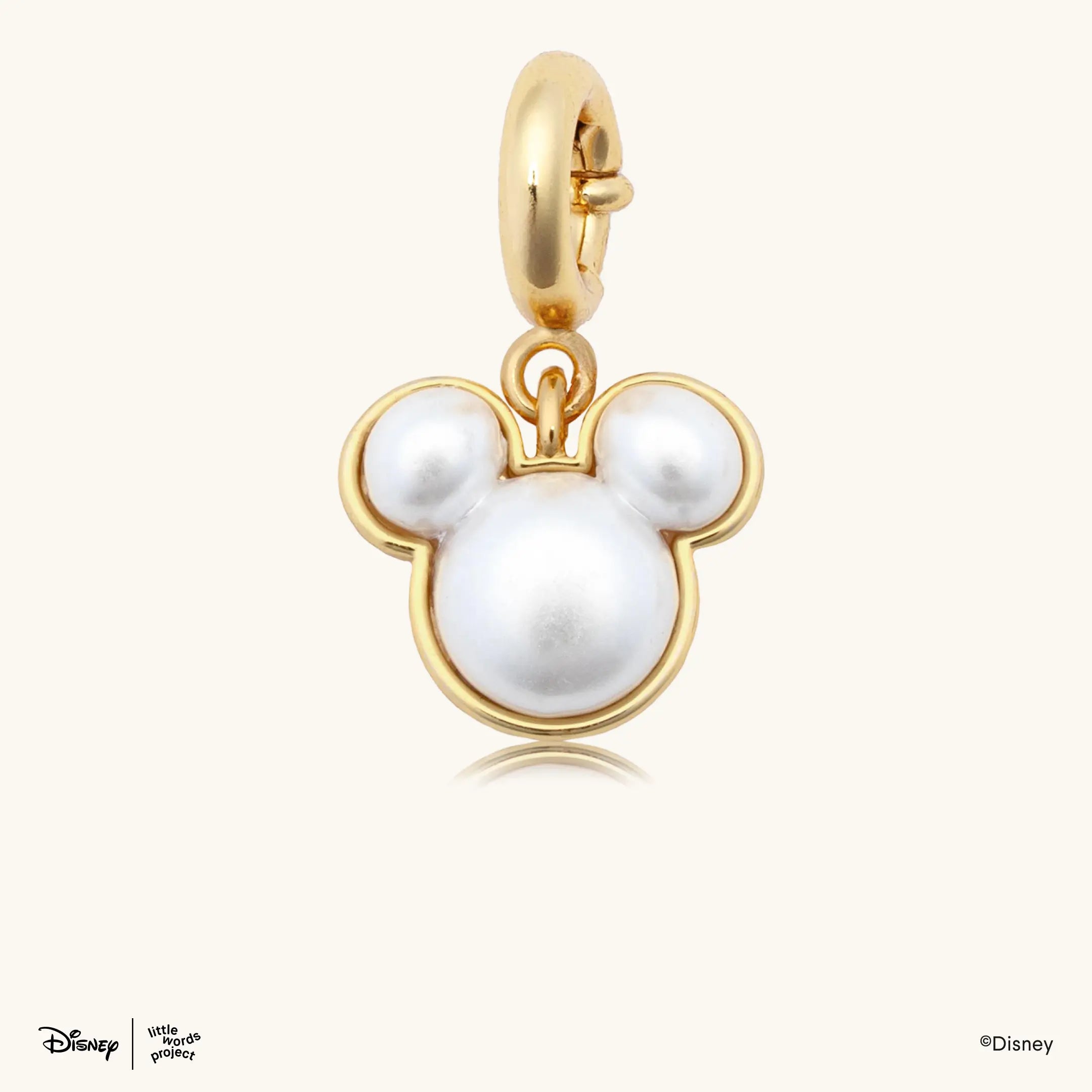 Mickey Mouse Pearl Charm from Disney Mickey and Friends, gold plated Mickey Mouse head charm with a pearl center on a gold plated clasp