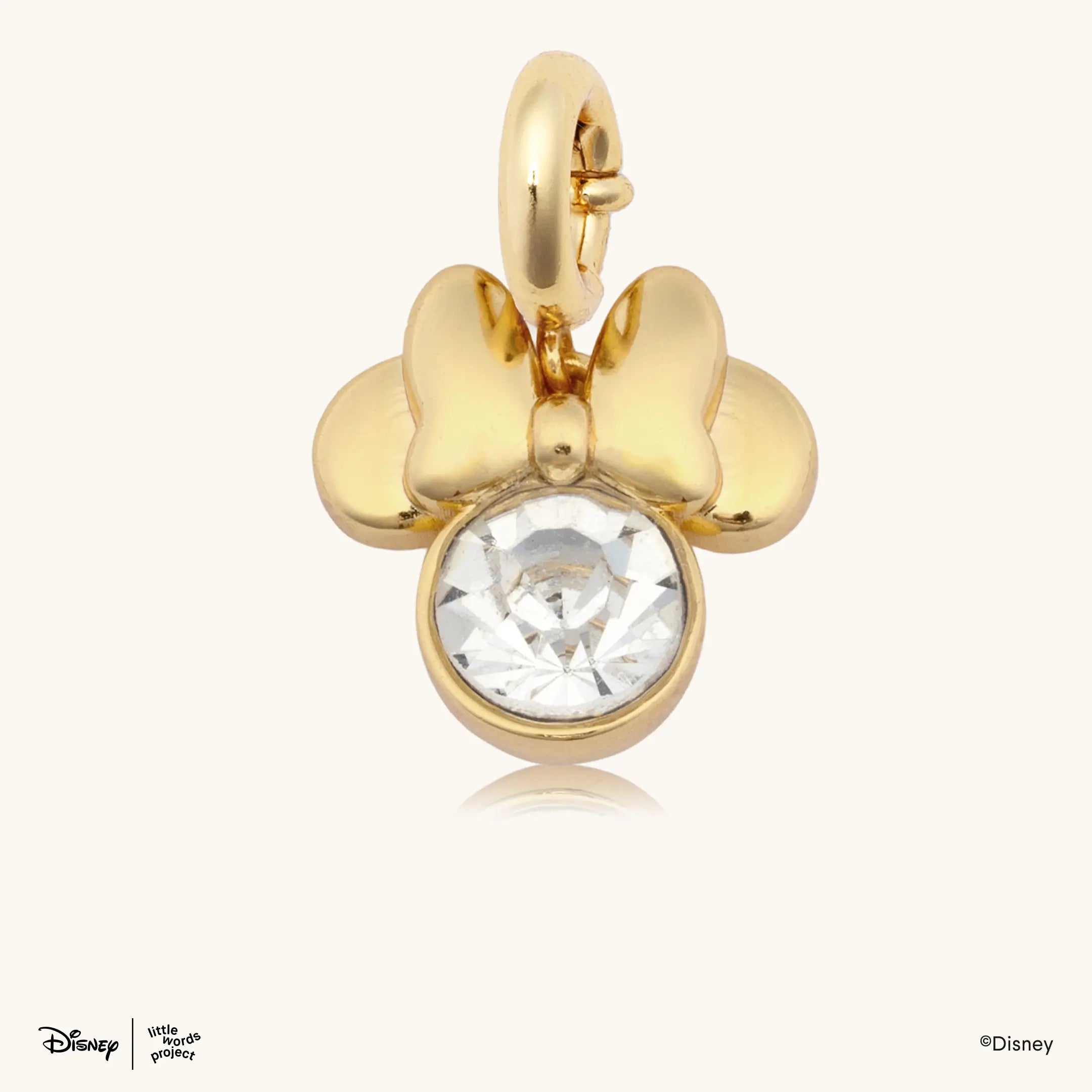 Minnie Mouse Silhouette Charm from Disney Mickey and Friends, gold plated Minnie Mouse charm with a bow and a round crystal on a gold plated clasp