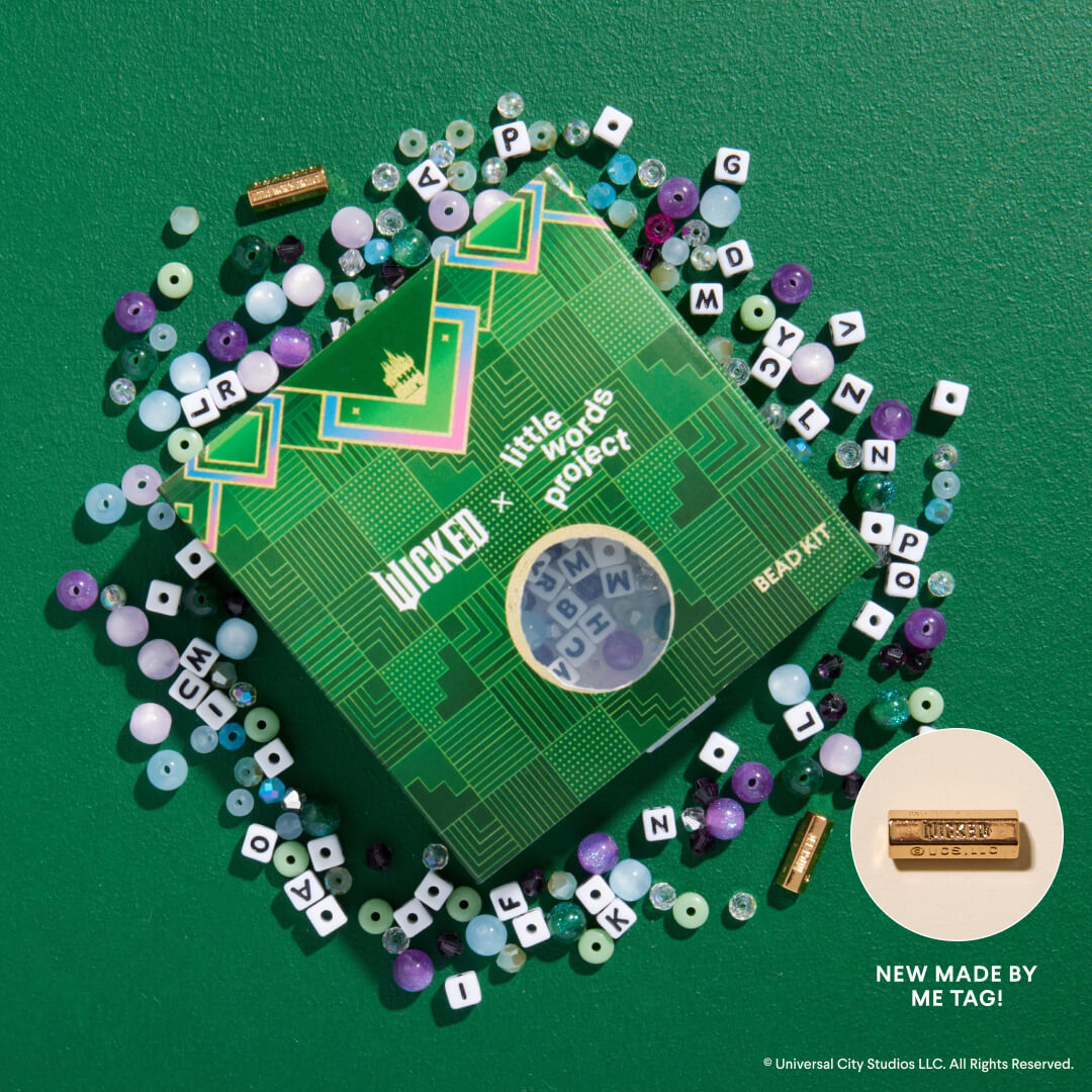 Green box with 'Wicked x Little Words Project' branding surrounded by colorful letters on a green background.