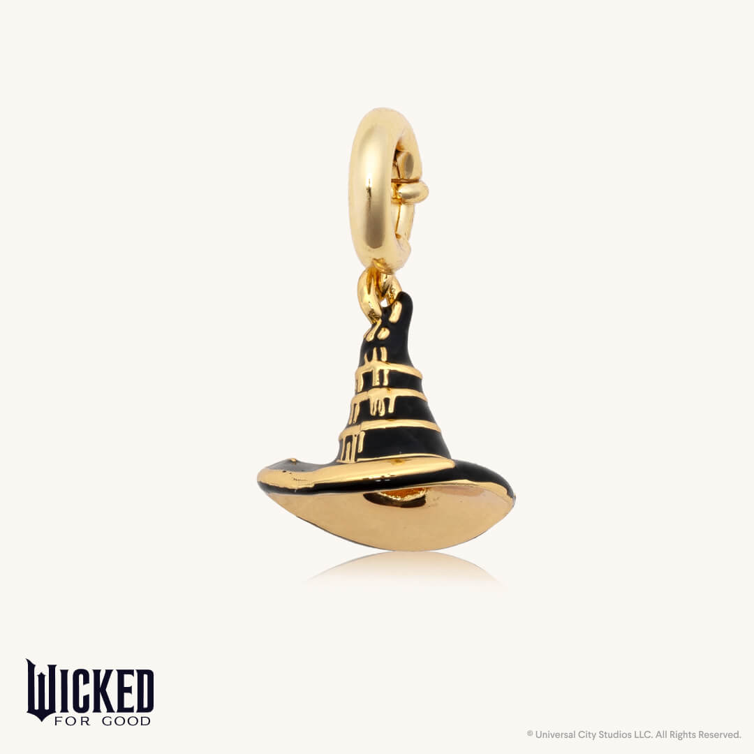Gold and black witch hat charm on a white background with 'Wicked for Good' branding.