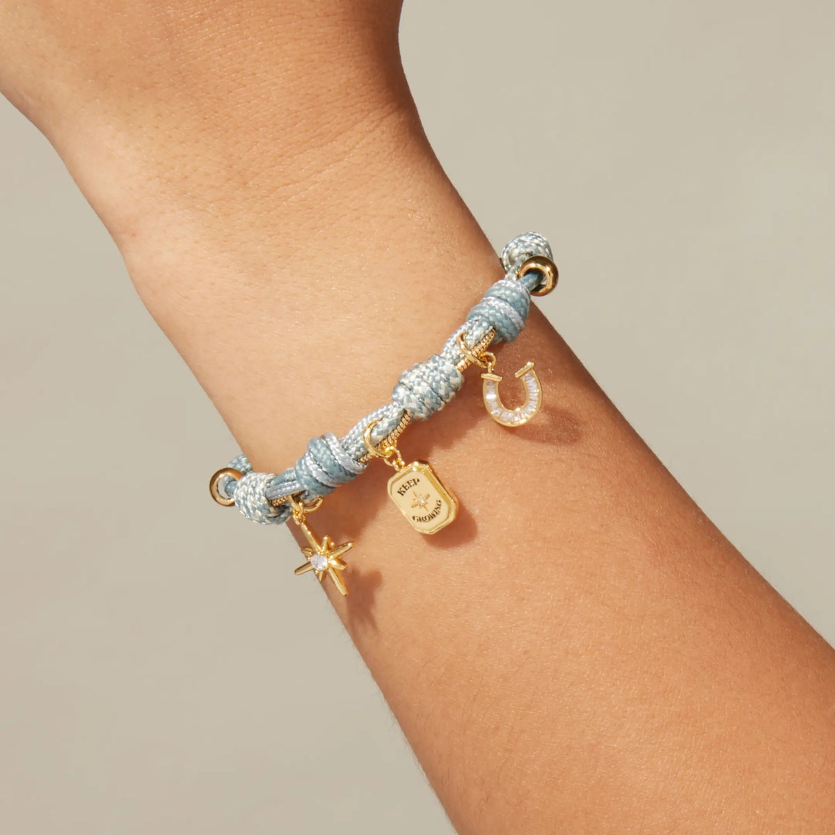 Keep Growing Paracord Charm Bracelet worn