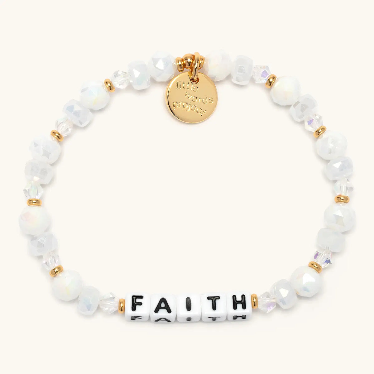 Faith bracelet from the Faith Bracelet Set, Snowflake Sparkle bead pattern with iridescent white and clear crystal beads, flat-lay on cream background