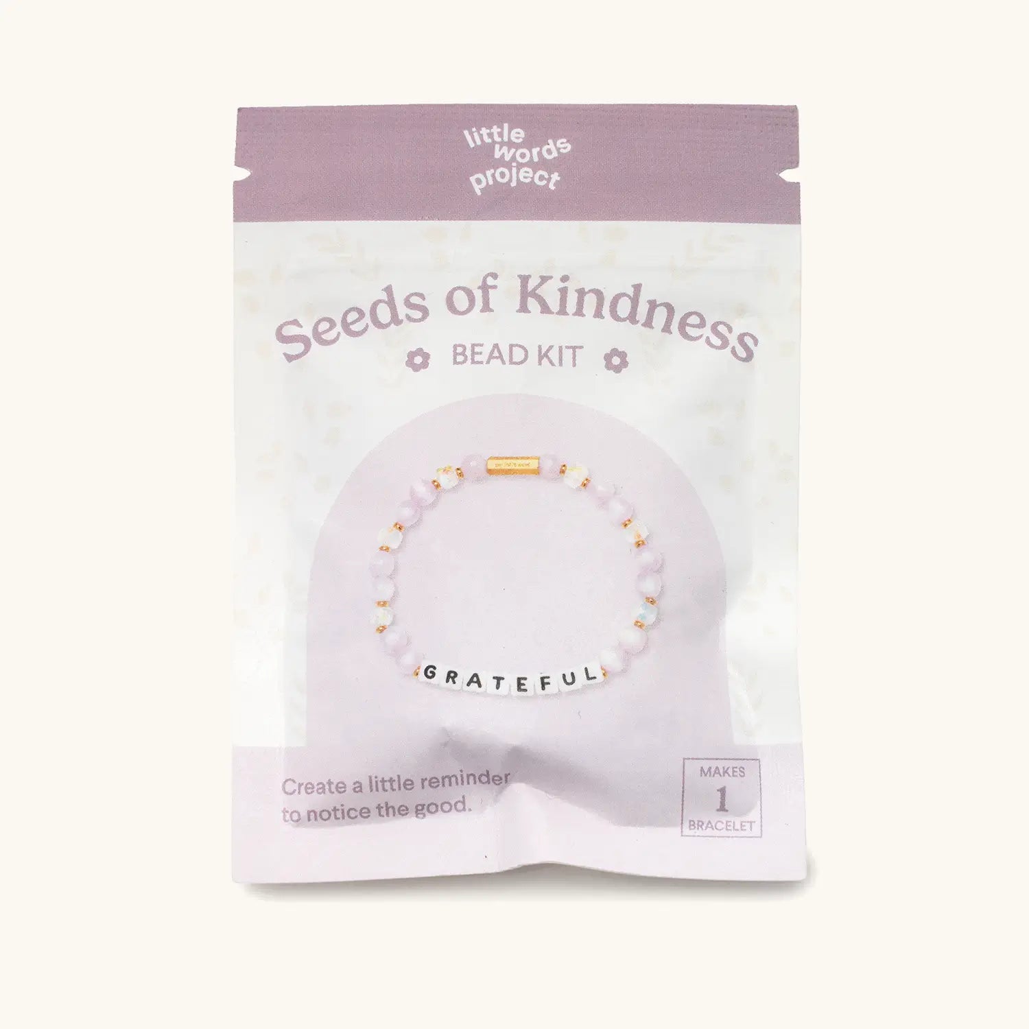 Grateful Bead Kit — flat-lay of loose beads in warm, muted tones