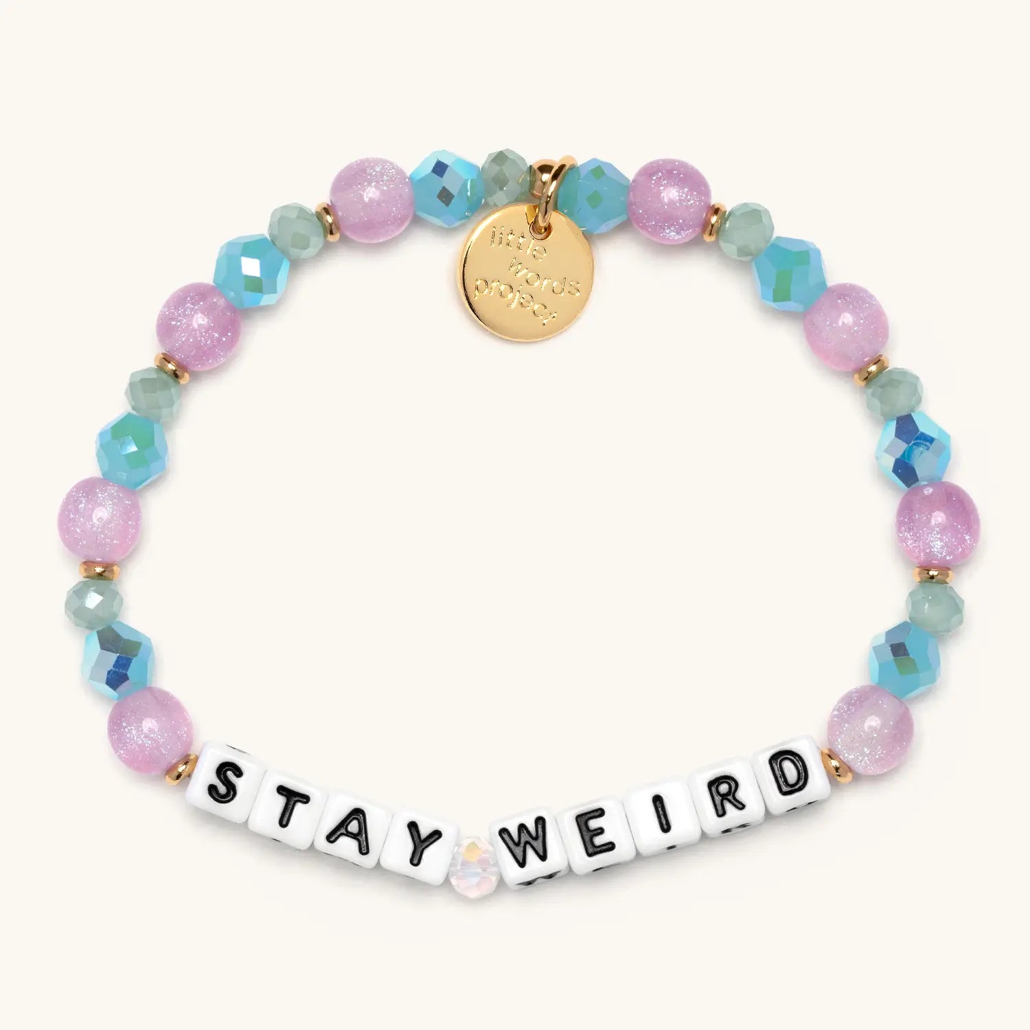 Colorful beaded bracelet with 'STAY WEIRD' on a white background