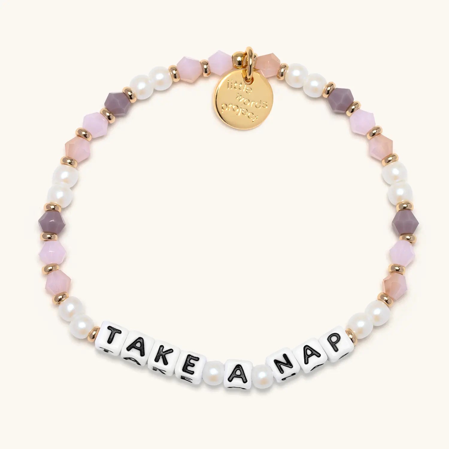 Bracelet with multicolored beads and 'TAKE A NAP' on a white background