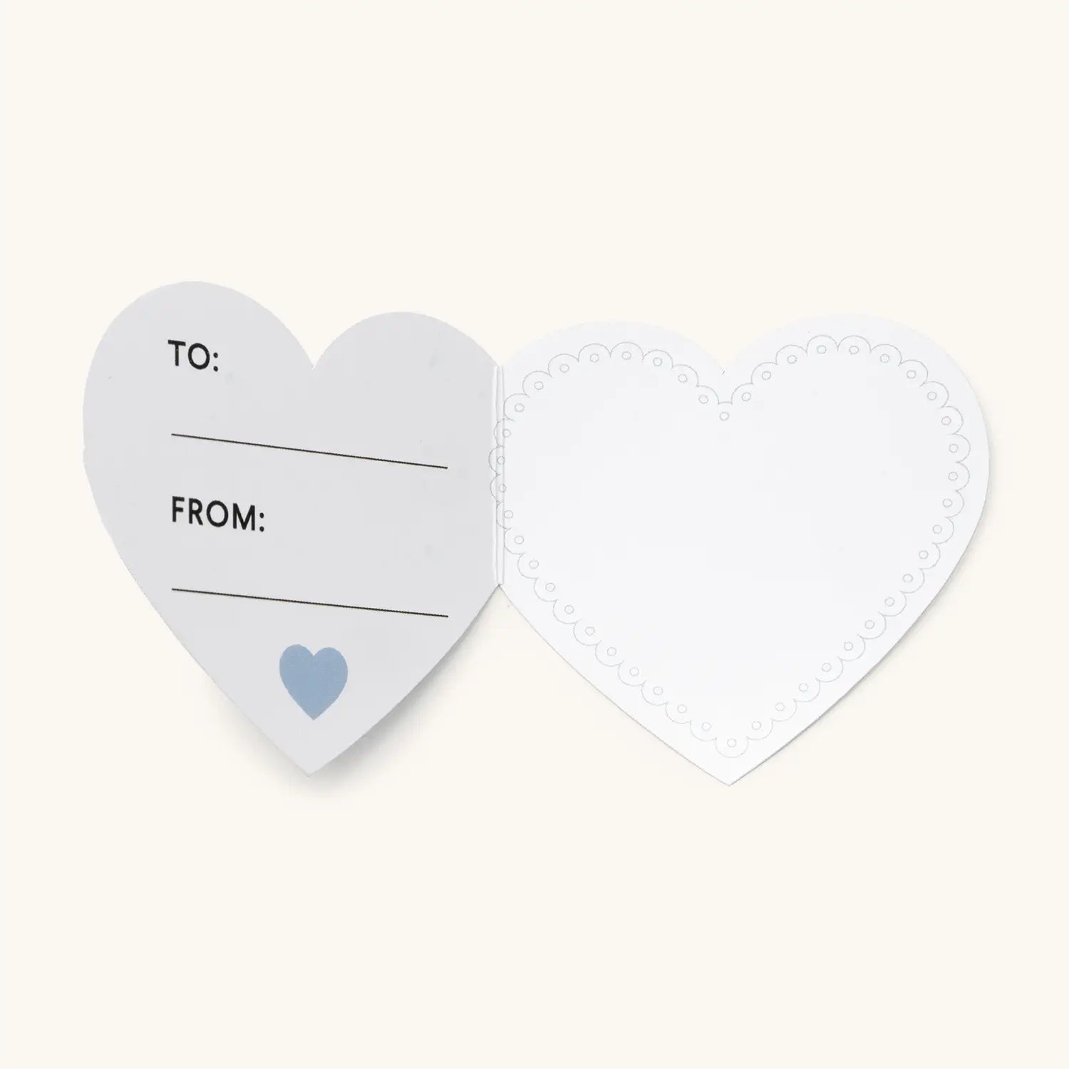 Heart-shaped gift tag with 'To' and 'From' fields on a white background