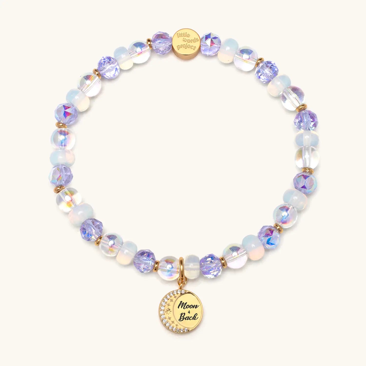 Multicolored beaded bracelet with gold charm on a white background
