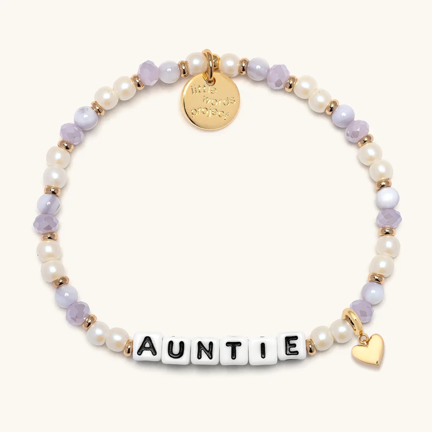 Bracelet with 'Auntie' charm and gold heart on a white background
